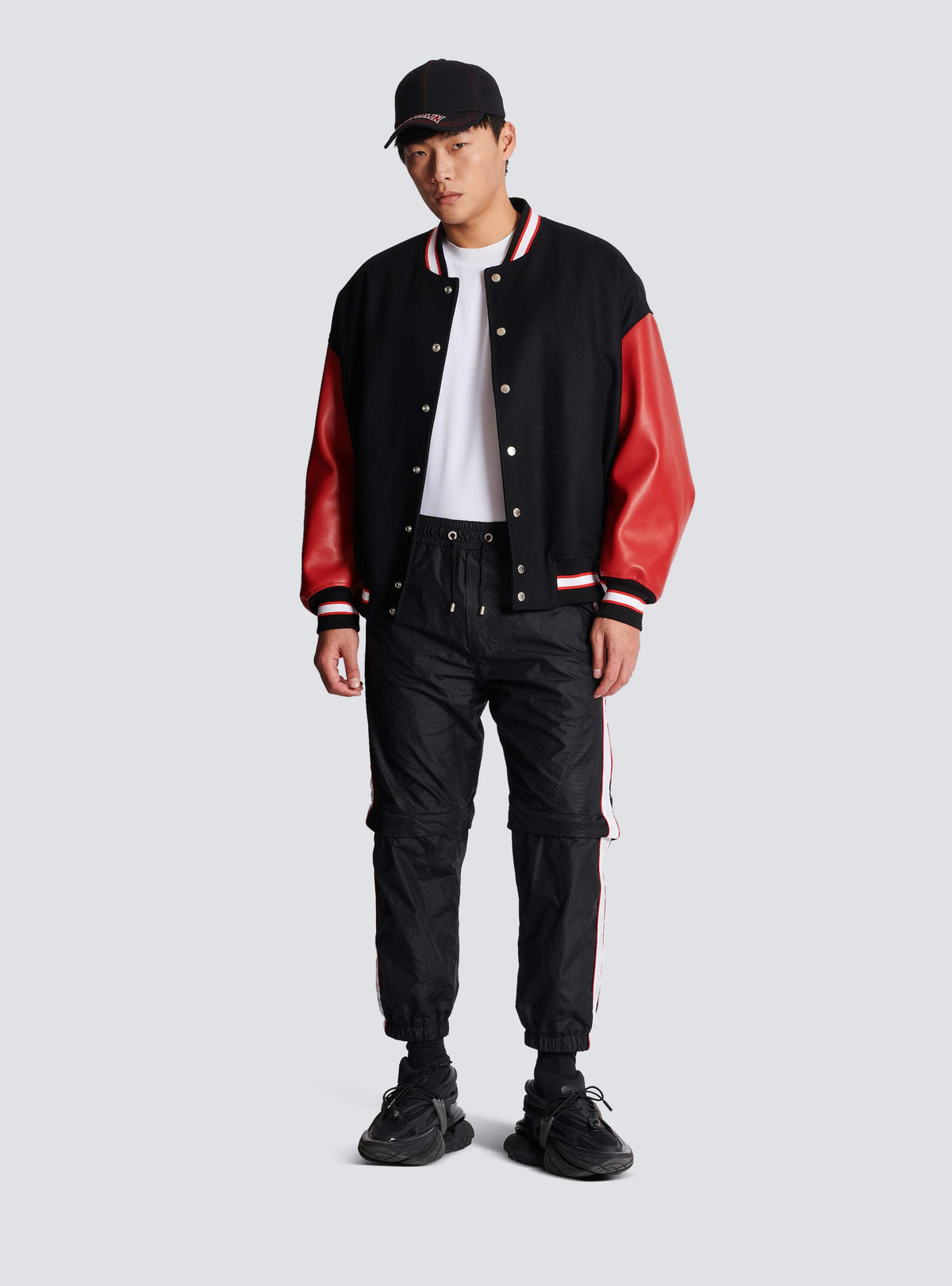 BALMAIN MEN'S BLACK NYLON CONVERTIBLE TRACK PANTS